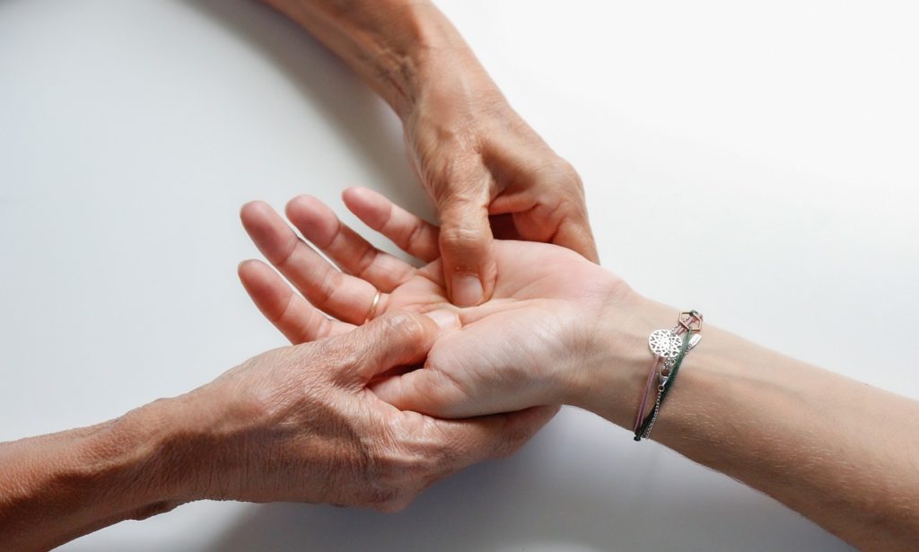 Hand being massaged